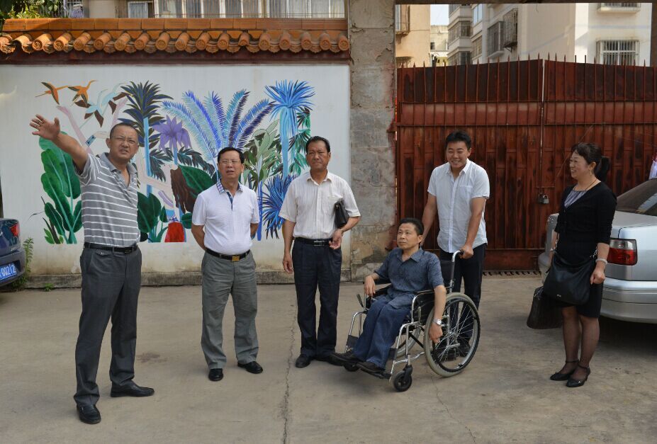 图为省残联领导到我校调研（一）